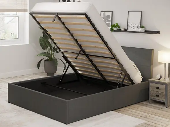 Grey upholstered storage bed with gas lift